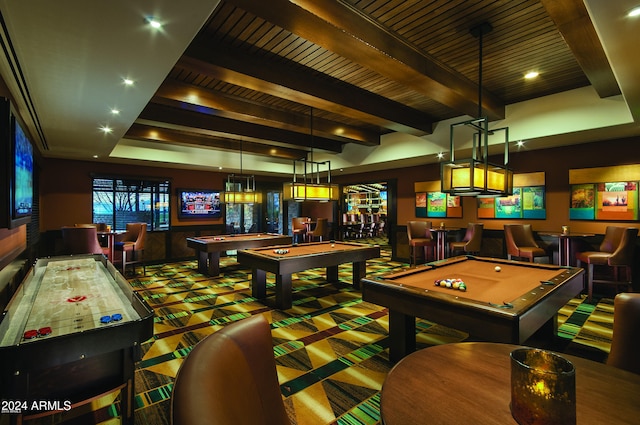 recreation room featuring carpet, beam ceiling, bar, and billiards