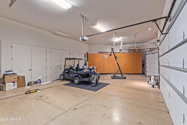 garage featuring a garage door opener