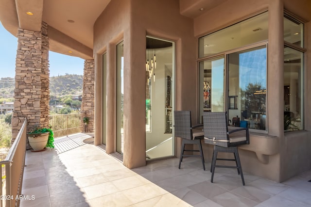 view of patio / terrace with a mountain view