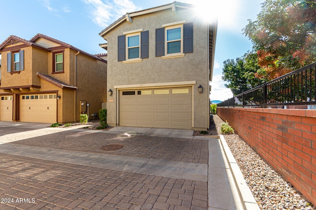 view of front of property with a garage