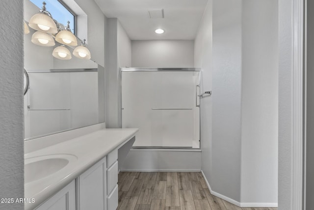 bathroom featuring wood-type flooring and vanity