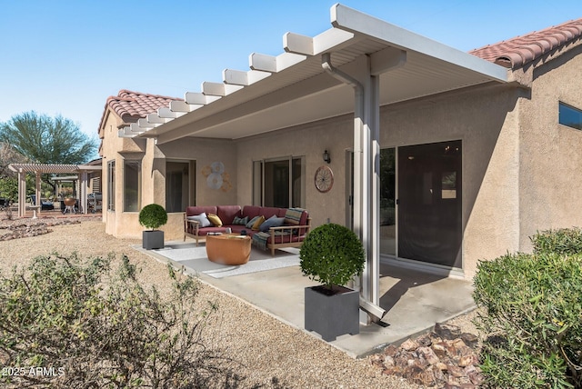 back of property featuring outdoor lounge area, a patio, and a pergola