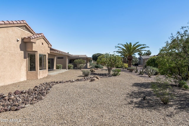 view of yard featuring a patio