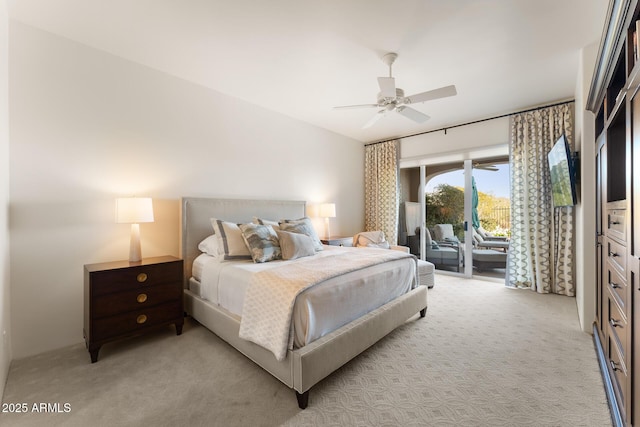 bedroom featuring access to exterior, light carpet, vaulted ceiling, and ceiling fan