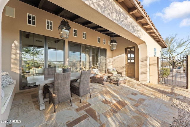 view of patio with outdoor dining area