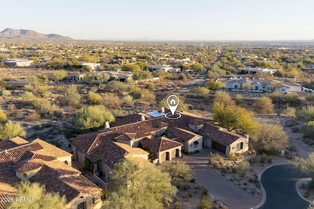 drone / aerial view featuring a mountain view