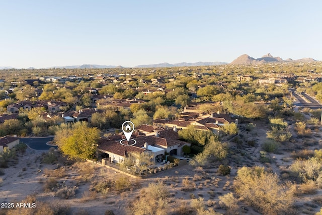 birds eye view of property featuring a mountain view