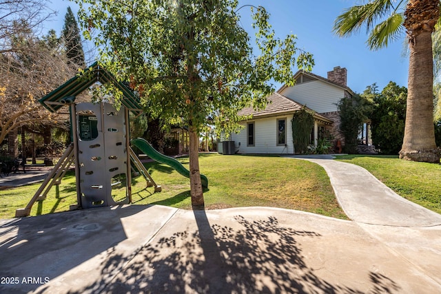 25509 S Lime Dr, Queen Creek, AZ 85142 - exterior space featuring a tiled roof, a chimney, a playground, central air condition unit, and a front lawn