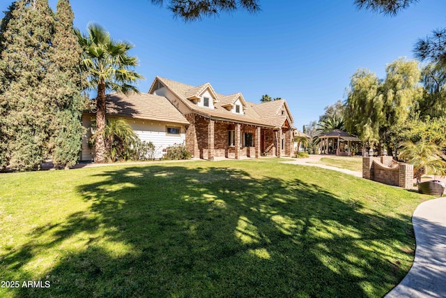 25509 S Lime Dr, Queen Creek, AZ 85142 - view of front of home with a gazebo, a front lawn, and brick siding