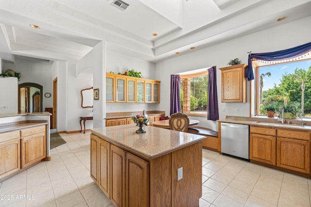 25509 S Lime Dr, Queen Creek, AZ 85142 - kitchen featuring stainless steel dishwasher, visible vents, a kitchen island, a sink, and a raised ceiling