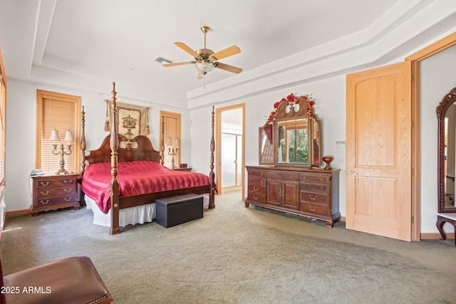 25509 S Lime Dr, Queen Creek, AZ 85142 - carpeted bedroom featuring a raised ceiling, ceiling fan, baseboards, and visible vents