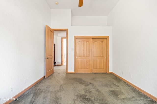 25509 S Lime Dr, Queen Creek, AZ 85142 - unfurnished bedroom featuring carpet flooring, baseboards, and a ceiling fan