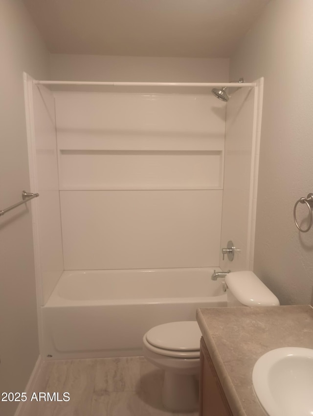 full bathroom featuring shower / washtub combination, vanity, and toilet