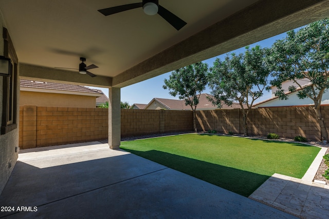 exterior space featuring ceiling fan and a patio