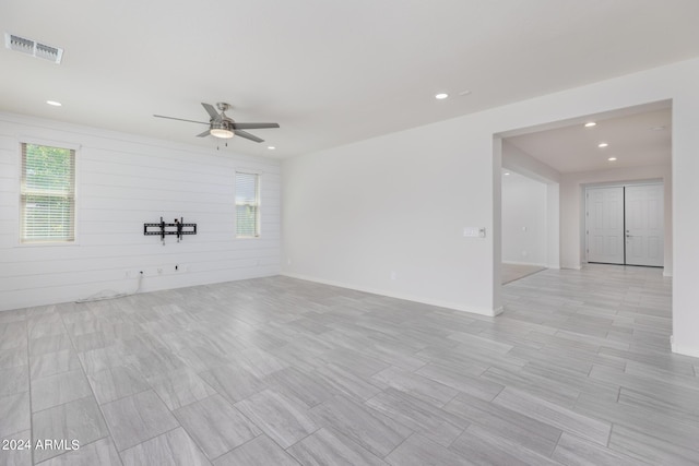 empty room featuring ceiling fan