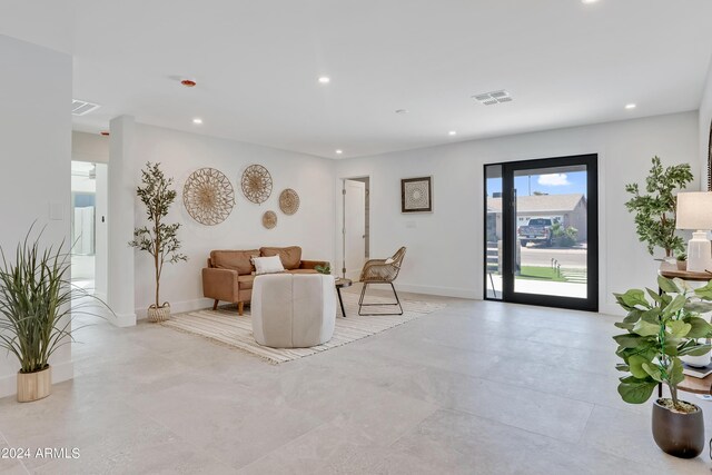 tiled dining room with sink and ceiling fan