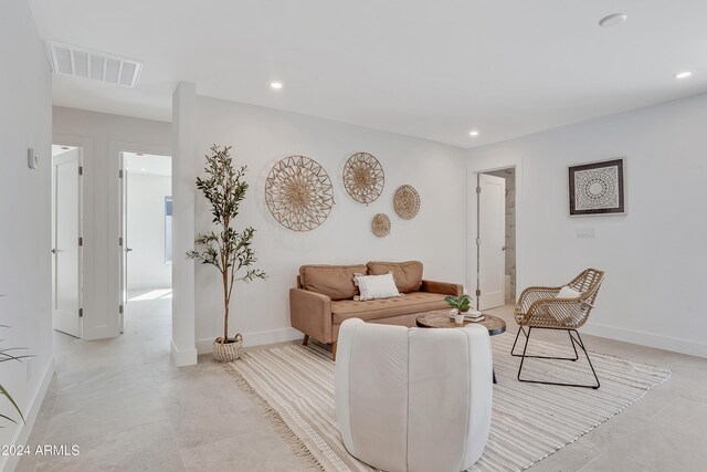 living room featuring ceiling fan