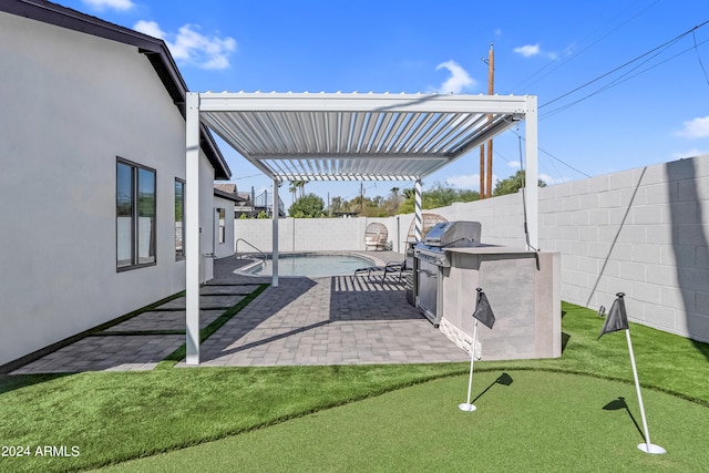 view of patio with area for grilling and a fenced in pool