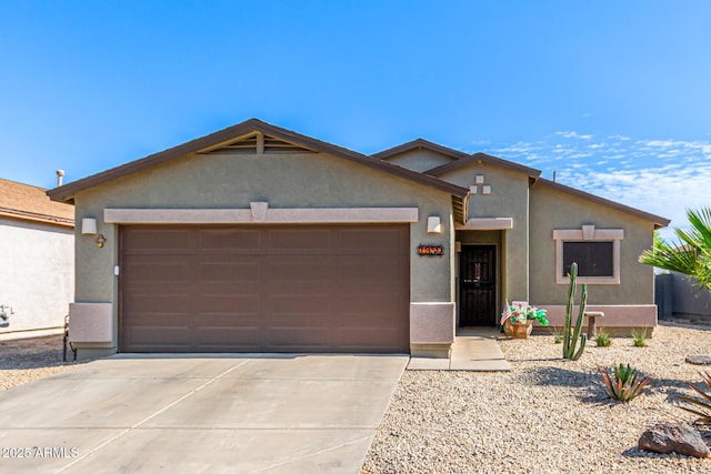 1950 E Dust Devil Dr, San Tan Valley, AZ 85143 - view of front facade with an attached garage, stucco siding, and driveway