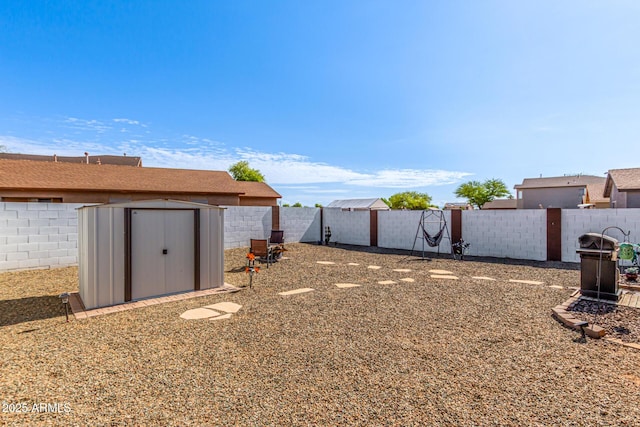 1950 E Dust Devil Dr, San Tan Valley, AZ 85143 - fenced backyard with a storage unit and an outdoor structure