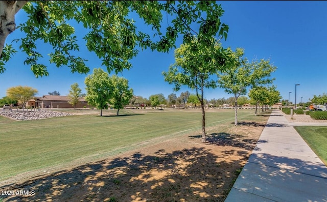 1950 E Dust Devil Dr, San Tan Valley, AZ 85143 - view of community featuring a lawn