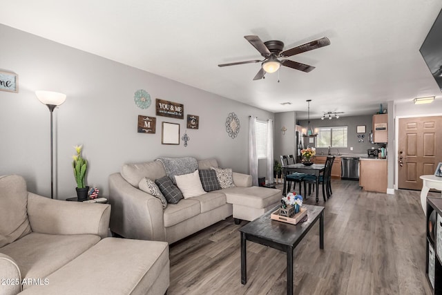 1950 E Dust Devil Dr, San Tan Valley, AZ 85143 - living area featuring a ceiling fan and wood finished floors