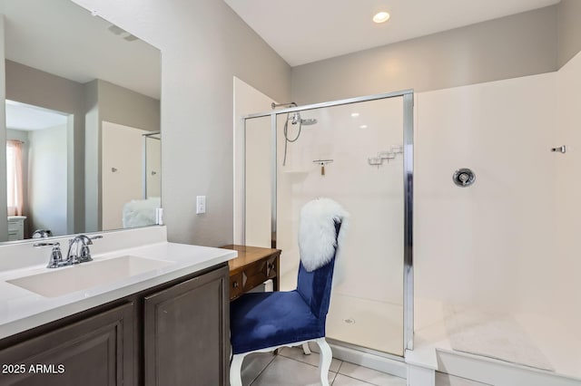 23730 W Hess Ave, Buckeye, AZ 85326 - full bathroom with a shower stall, tile patterned floors, vanity, and recessed lighting