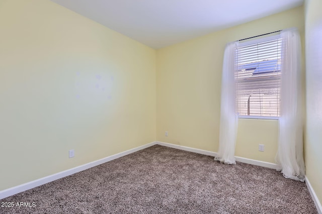 23730 W Hess Ave, Buckeye, AZ 85326 - carpeted empty room featuring baseboards