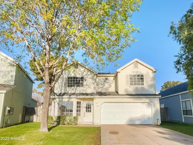 view of front facade featuring a garage and a front yard