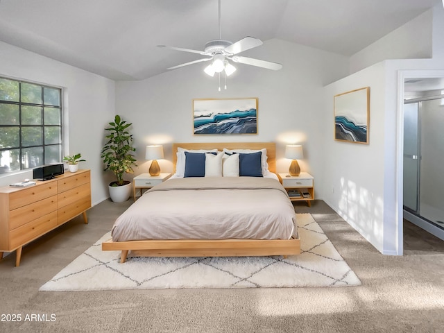 carpeted bedroom featuring vaulted ceiling and ceiling fan