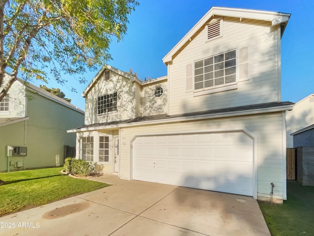 view of front of home featuring a garage and a front lawn