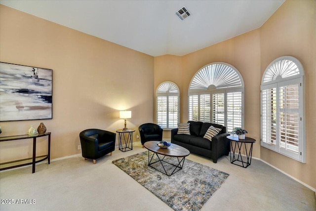 living room featuring light carpet