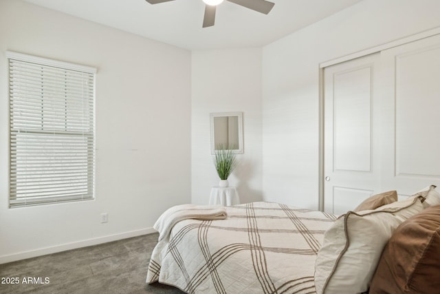 bedroom with a closet, a ceiling fan, baseboards, and carpet floors