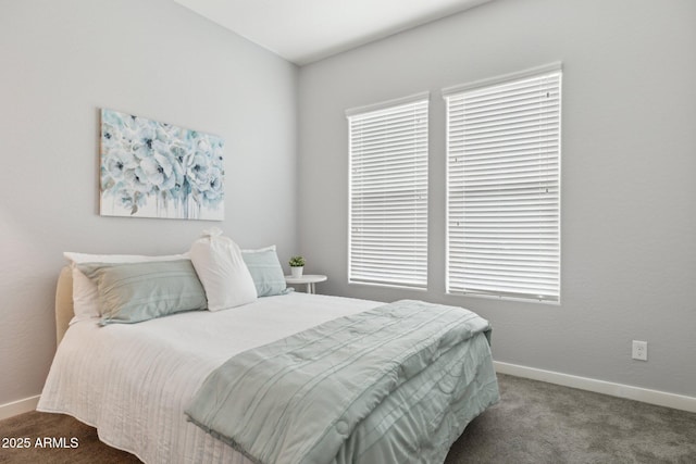 carpeted bedroom with baseboards