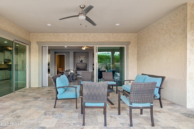 view of patio / terrace with ceiling fan