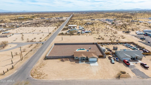 bird's eye view featuring view of desert and a mountain view