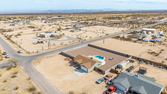 bird's eye view featuring view of desert and a mountain view