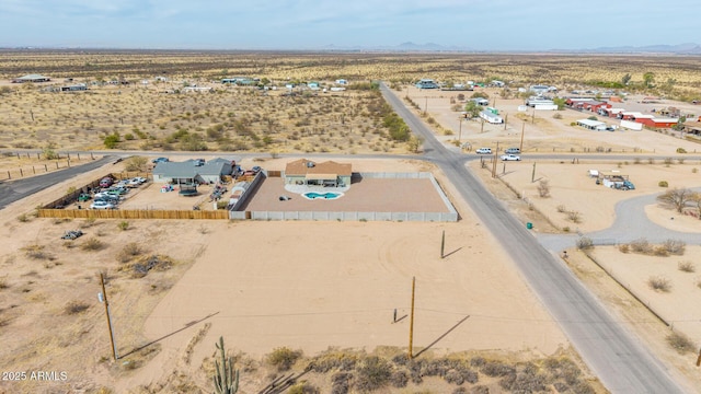 aerial view with view of desert and a mountain view