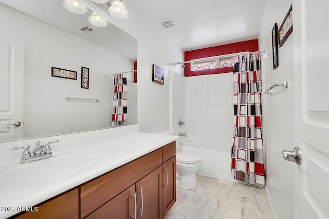 bathroom with vanity, visible vents, marble finish floor, and toilet