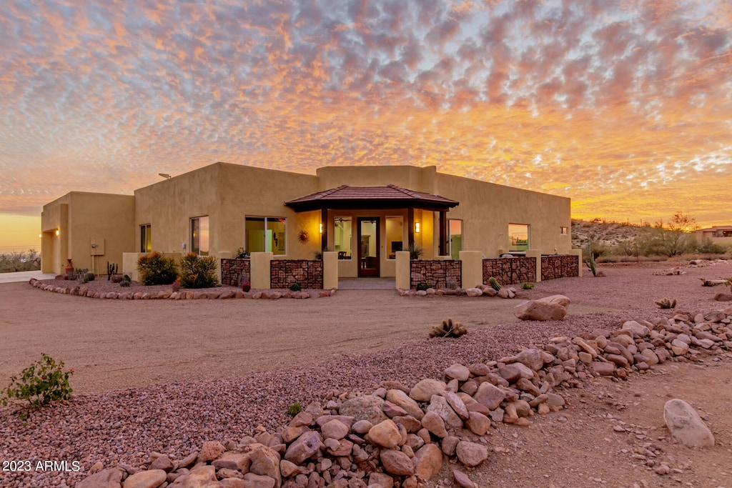 view of adobe home