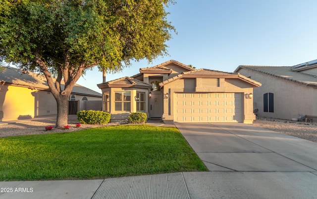 8319 E Plata Ave, Mesa, AZ 85212 - view of front facade with an attached garage, stucco siding, a front yard, driveway, and a tiled roof
