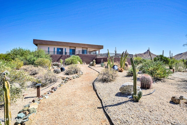 view of front of property with a mountain view