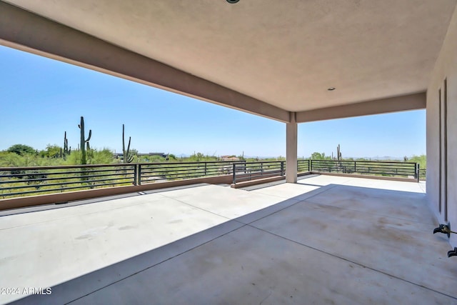 view of patio / terrace with a rural view