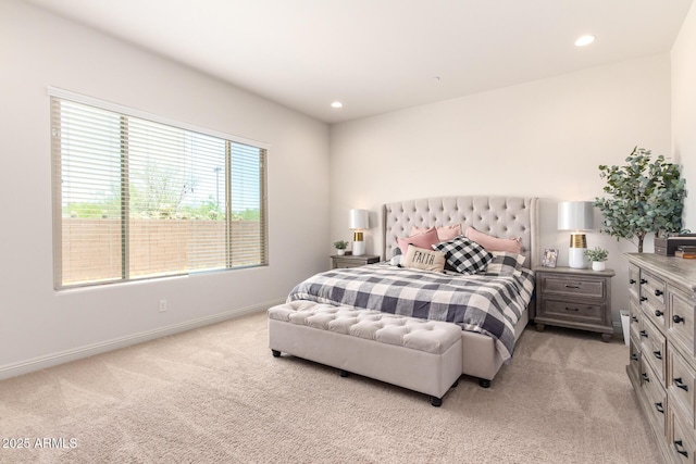 bedroom featuring recessed lighting, baseboards, and light carpet