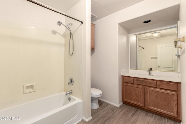 10209 W Jessie Ln, Peoria, AZ 85383 - full bathroom featuring toilet, shower / bath combination, wood finished floors, vanity, and baseboards