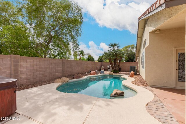 10209 W Jessie Ln, Peoria, AZ 85383 - view of swimming pool featuring cooling unit, a patio, and a fenced backyard
