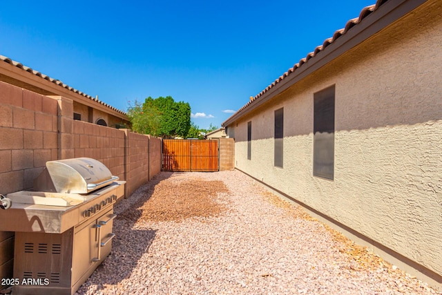10209 W Jessie Ln, Peoria, AZ 85383 - view of yard with fence and a gate