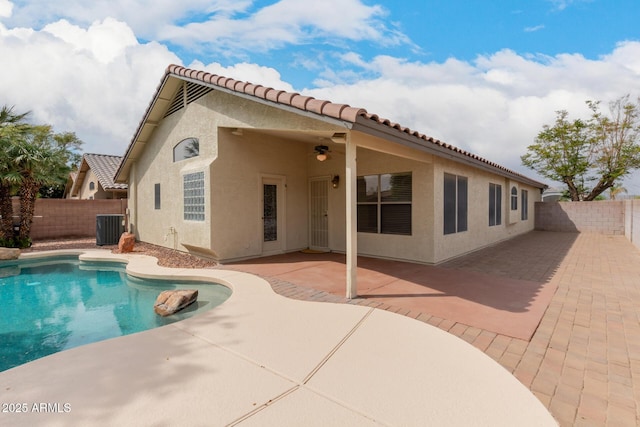 10209 W Jessie Ln, Peoria, AZ 85383 - rear view of house featuring central AC unit, stucco siding, and a tile roof
