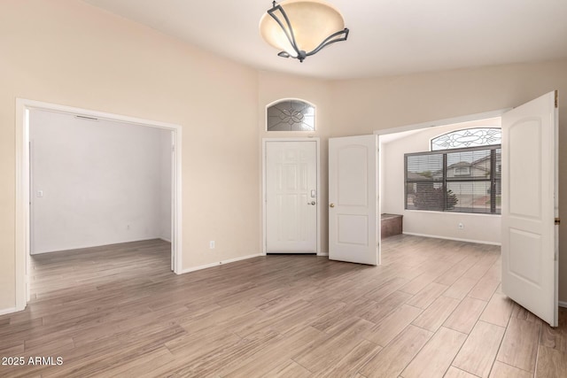 10209 W Jessie Ln, Peoria, AZ 85383 - spare room featuring light wood finished floors and baseboards