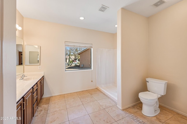 full bathroom with toilet, baseboards, visible vents, and vanity